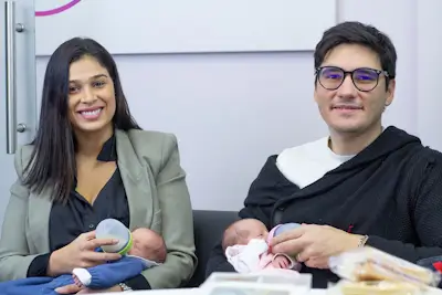 Parents with baby in office
